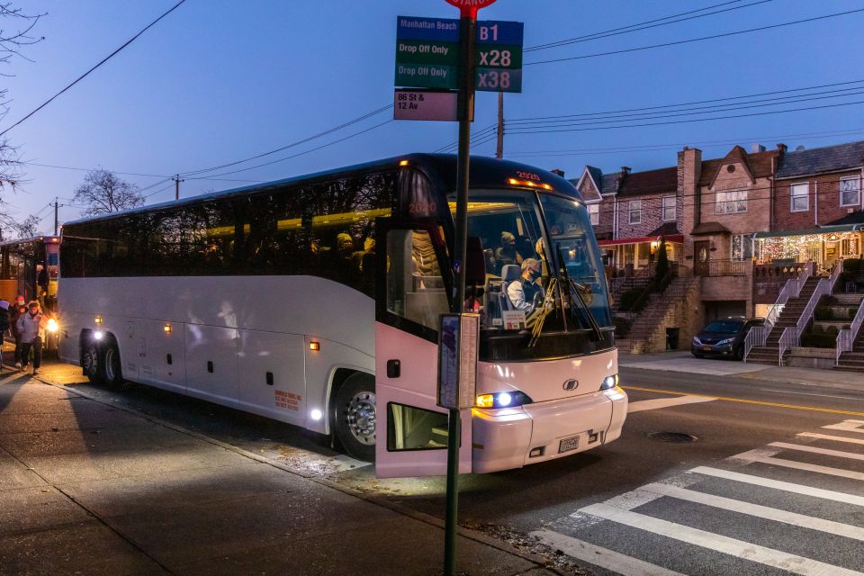 From Manhattan: 4-Hour Dyker Heights Holiday Lights Bus Tour - Returning via the Manhattan Bridge and finishing at Bryant Park