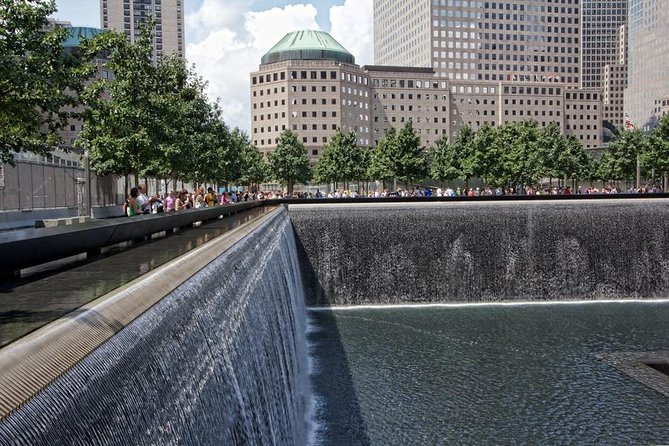 NYC City Tour: Statue of Liberty, 9/11 Memorial, Wall Street - Wall Street landmarks and the Charging Bull photo that everyone wants