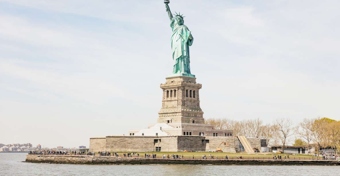 NYC: Wall Street Tour with 9/11 Memorial and Statue Ferry - 9/11 Memorial Pools and the Canyon of Heroes: pacing, respect, and meaning